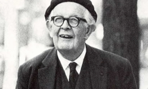 Potret hitam putih Jean Piaget, ahli biologi dan psikologi asal Swiss, penggagas teori perkembangan kognitif.